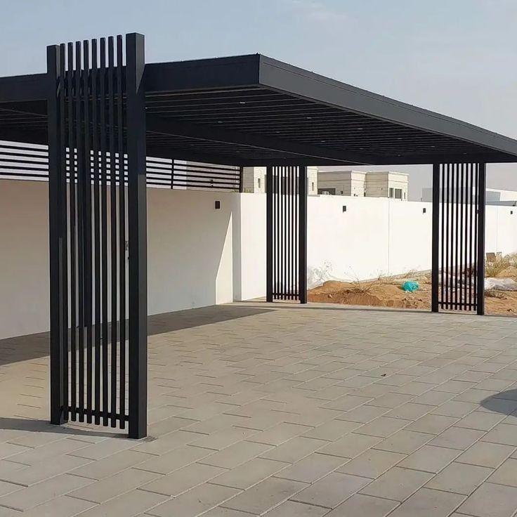 Custom brown powder-coated metal railing section in workshop