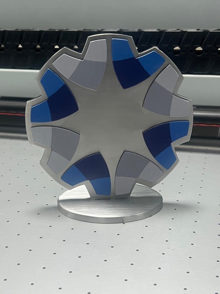 Custom gear-shaped acrylic trophy with blue and grey segments