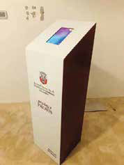 White Dubai Economic Development information kiosk with integrated screen