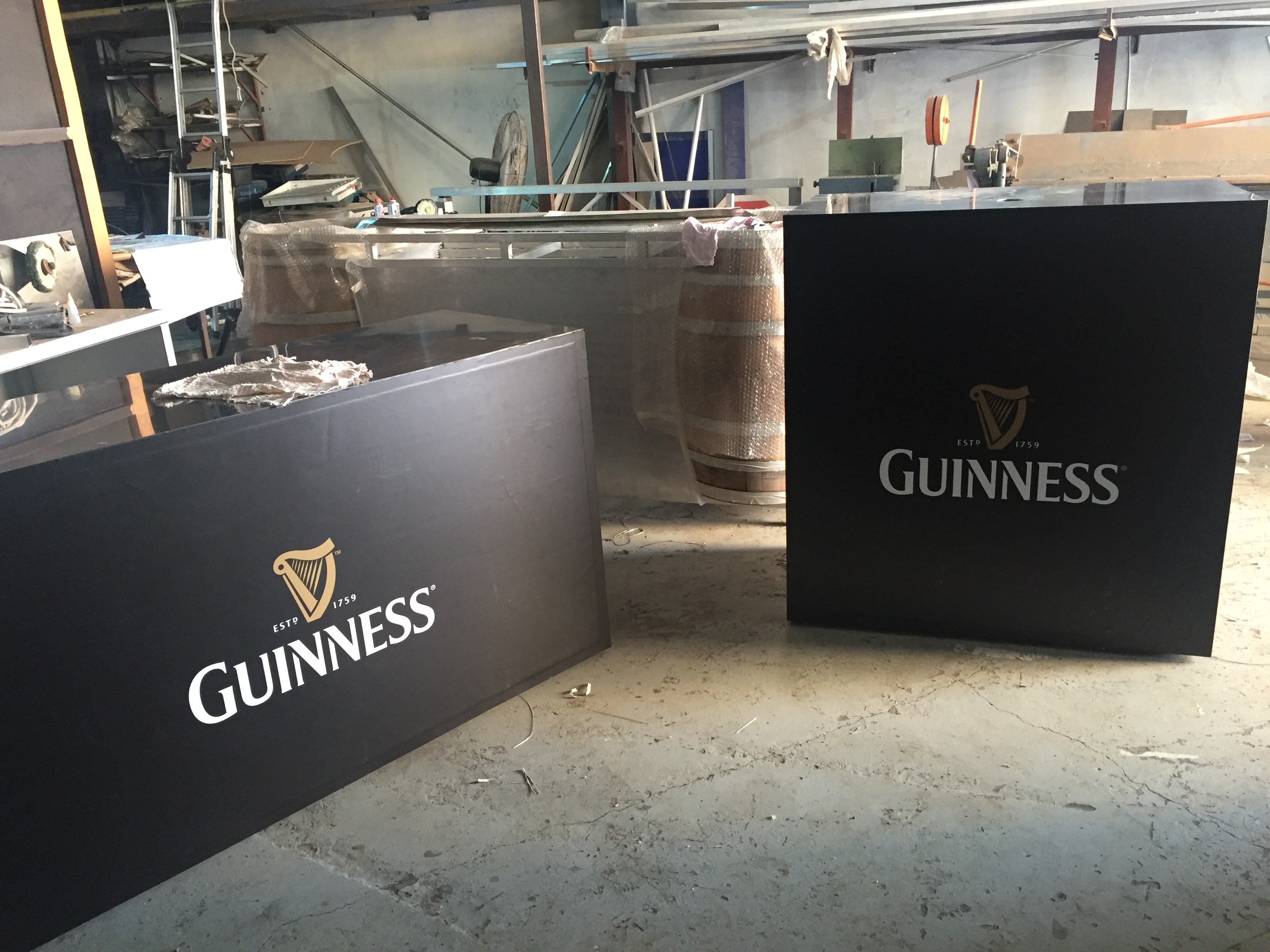 Guinness branded counter signs in workshop