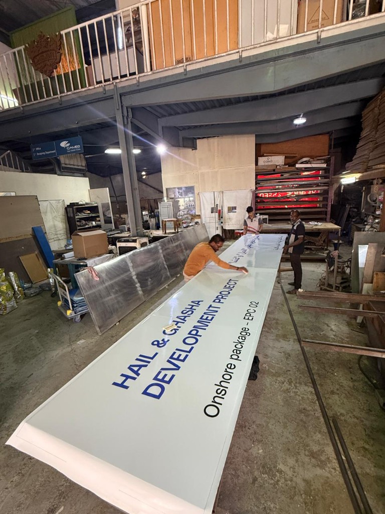 Large Hail and Ghasha project sign panel in Cameo workshop