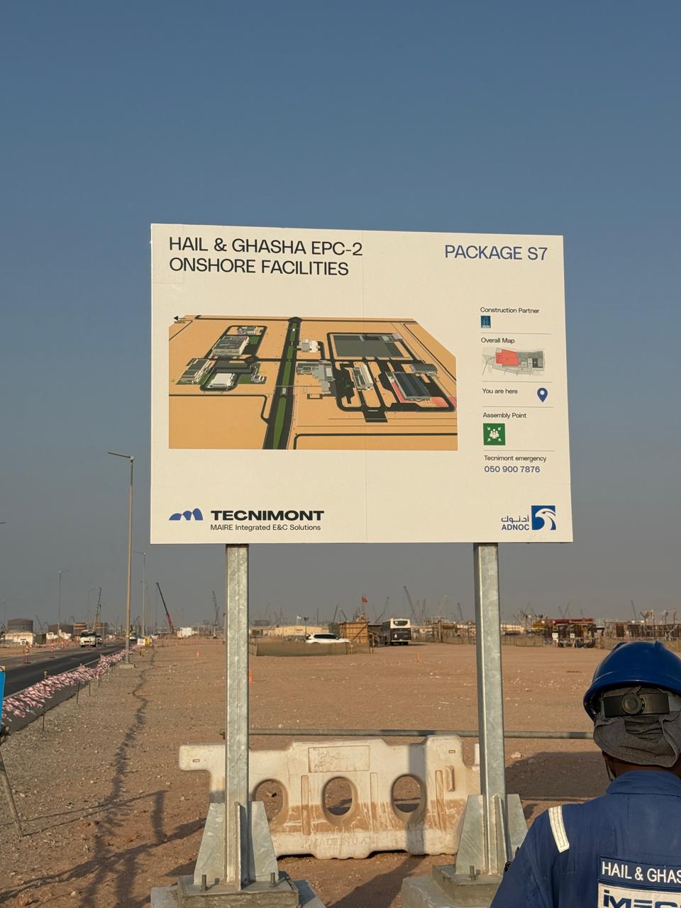 Illustrated project board mounted at construction site