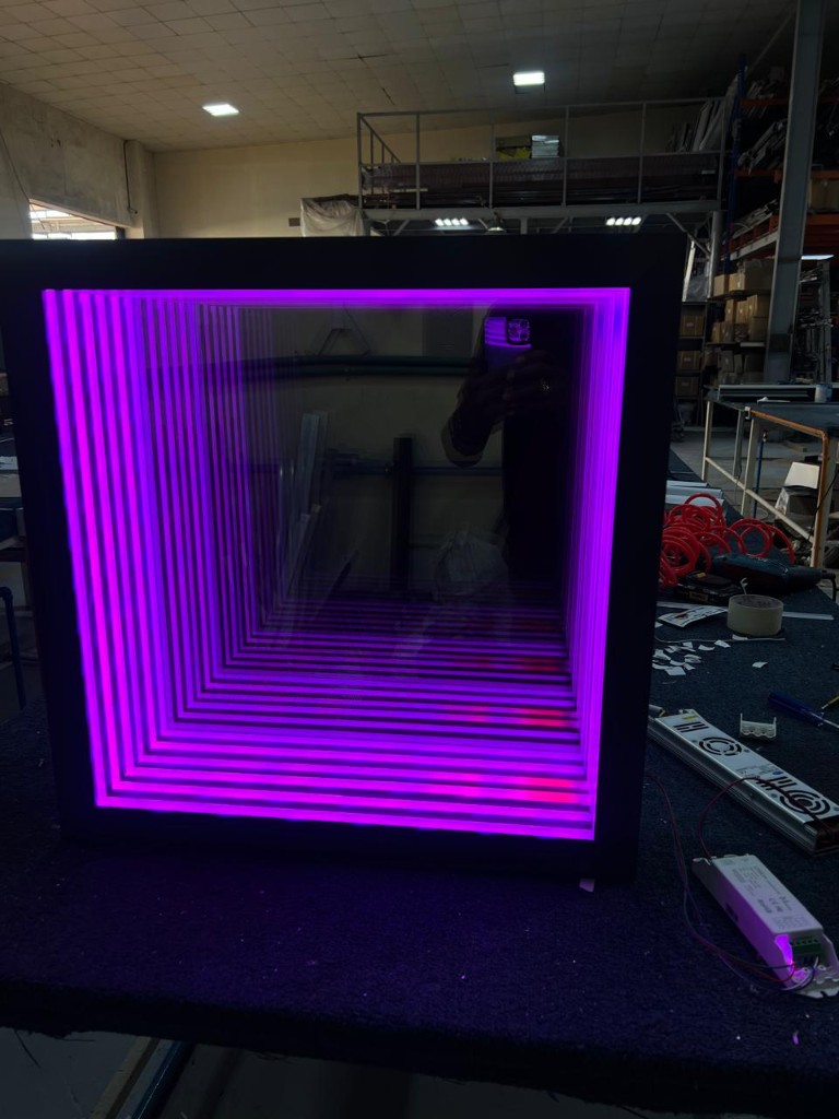 Square infinity mirror with purple LED lighting