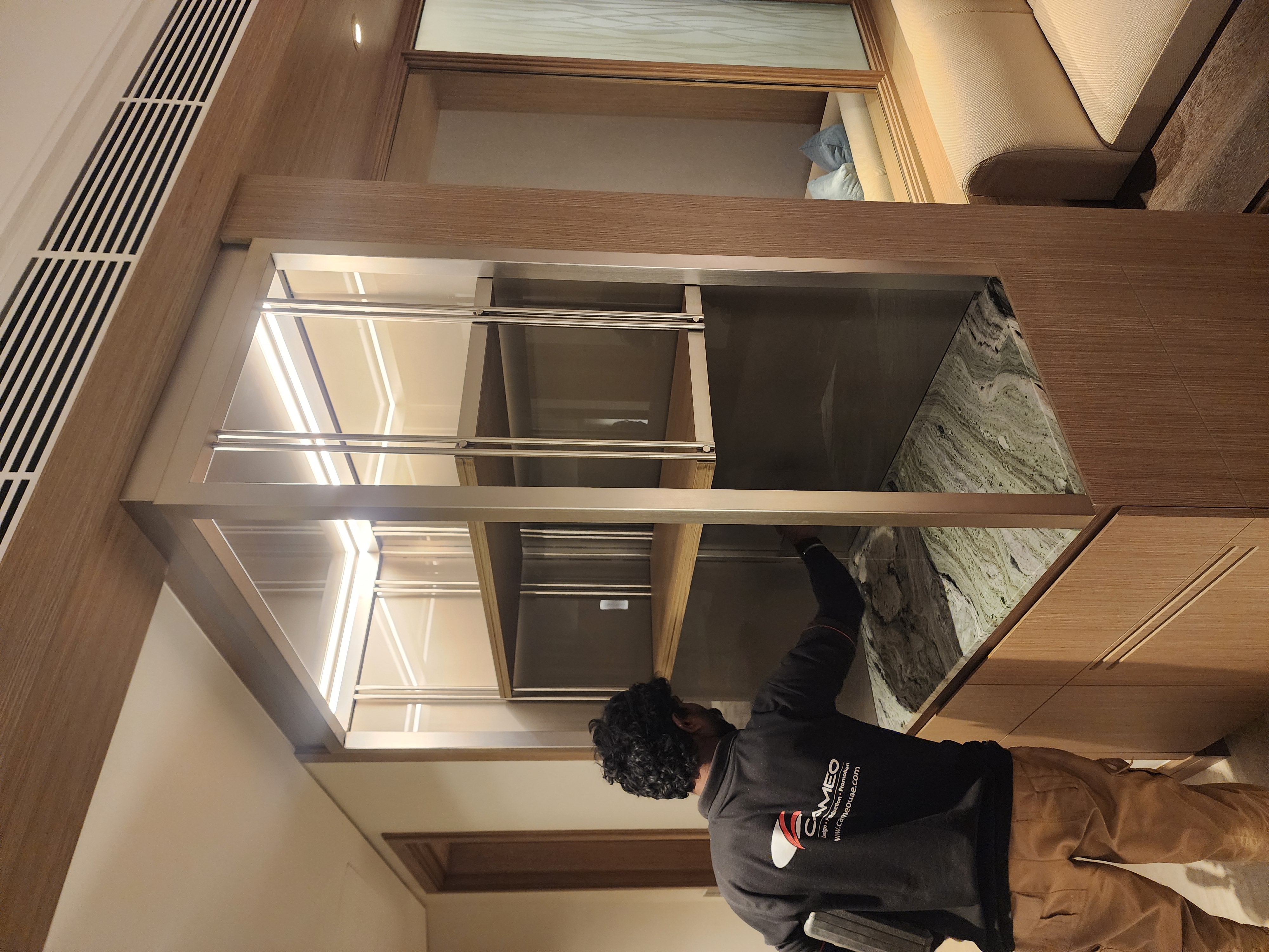 Interior glass partition installation in progress