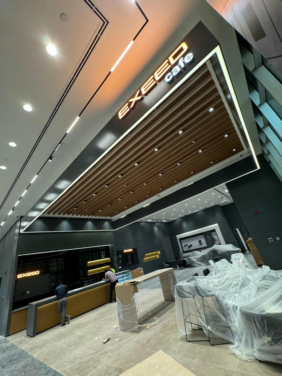 Luxury reception wall fit-out with illuminated ceiling details