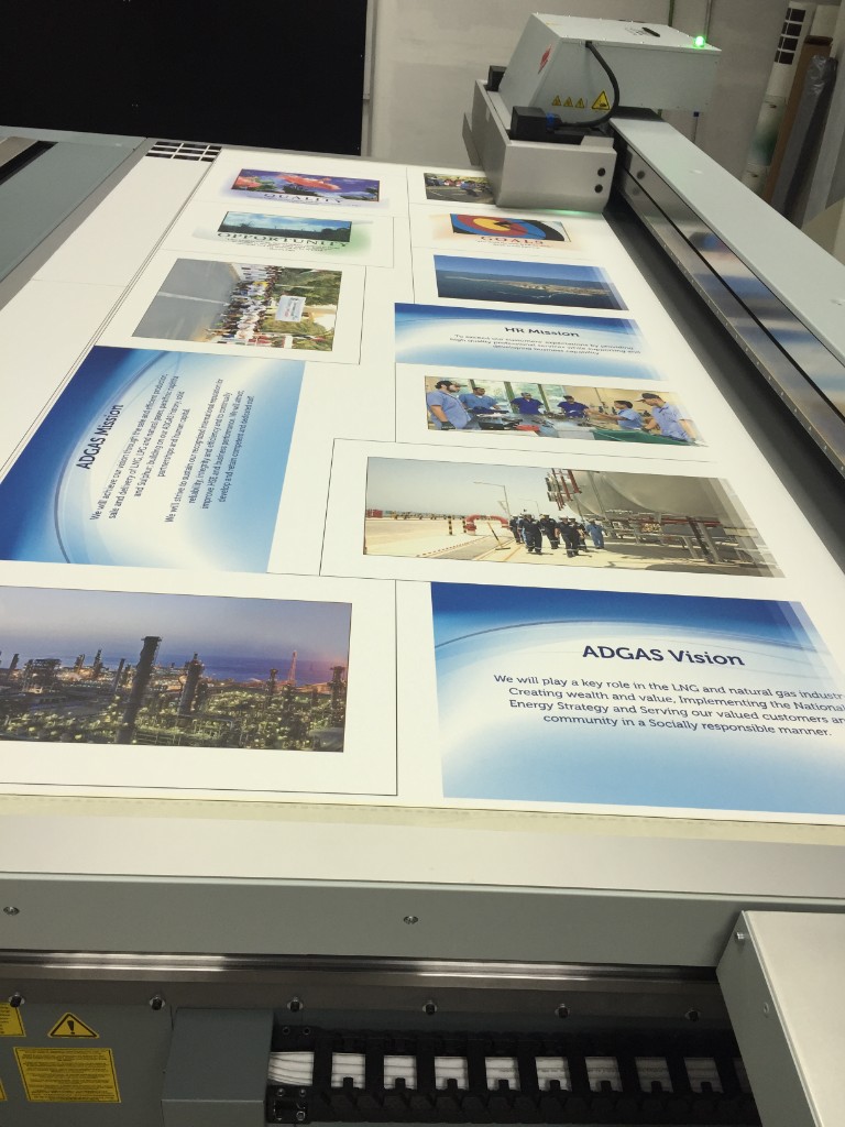 Mimaki large-format printer outputting glossy geometric vinyl graphics