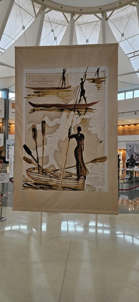 Nicolas Vial canoe silhouettes on large fabric banner