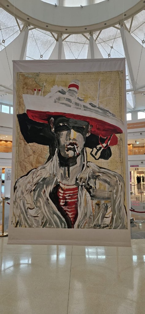 Nicolas Vial steamship hat portrait on hanging fabric banner