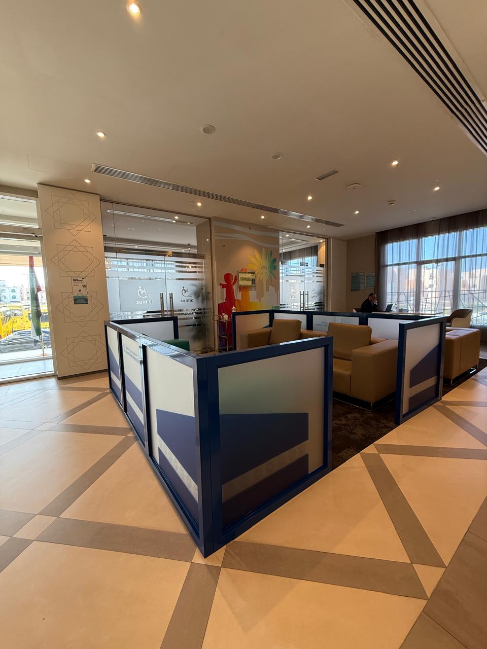 Office reception counter fit-out with dark panels