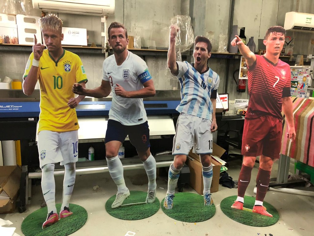 Life-size acrylic standees of Neymar, Kane, Messi and Ronaldo