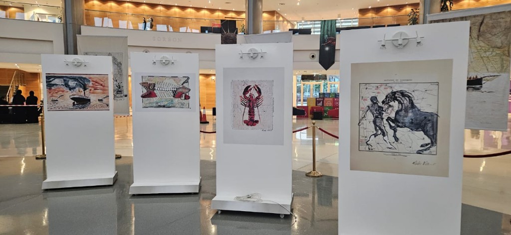 Illuminated freestanding exhibition print panels in Sorbonne atrium