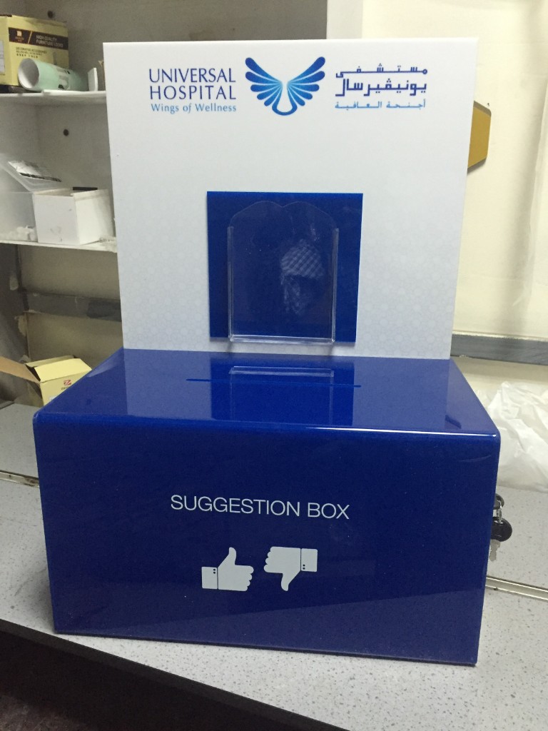 Universal Hospital branded acrylic suggestion box with form holder